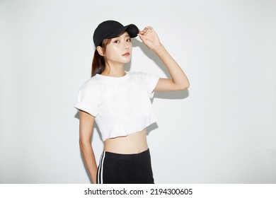 Young Asian Woman In Sporty Fashion