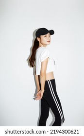 Young Asian Woman In Sporty Fashion