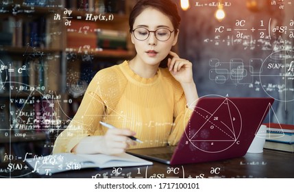 Young asian woman studying in the room. Education concept. Science technology. Mathematics.