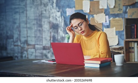 Young asian woman troubling in the room. Remote work. e-learning. - Powered by Shutterstock