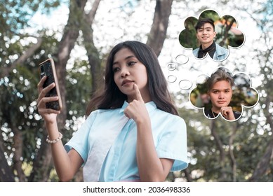 A Young Asian Woman Using A Dating App Deciding Who To Meet Up With. Thought Bubbles Show Two Handsome Men.