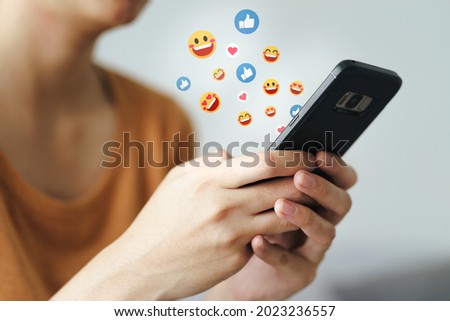 Young Asian woman using smartphone typing, chatting conversation. Network, technology concept
