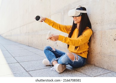 Young Asian Woman Using VR Set For Metaverse