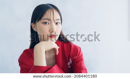 Young Asian woman wearing Japanese Kimono. Asian fashion concept. Stock photo © 