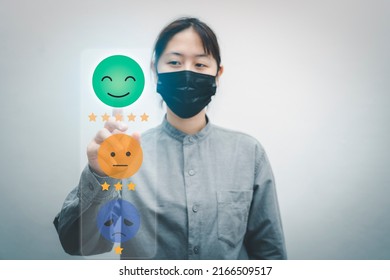 Young Asian Women Choosing Happy Smile Face On Virtual Touch Screen, Good Feedback Rating And Positive Customer Review,experience, Satisfaction Survey,mental Health Assessment, World Mental Health Day