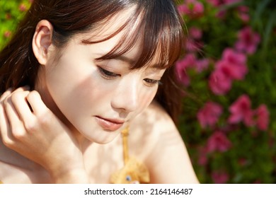 Young Asian Women Enjoying The Resort