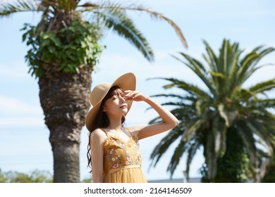 Young Asian Women Enjoying The Resort