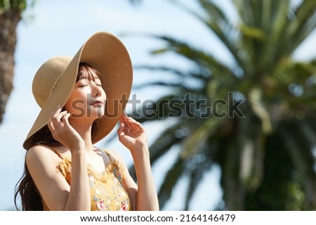 Young Asian women enjoying the resort