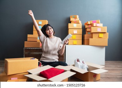 Young Asian Women Happy After New Order From Customer. Surprise And Shock Face Of Asian Woman Success On Making Big Sale Of His Online Store. Online Selling. Online Shopping