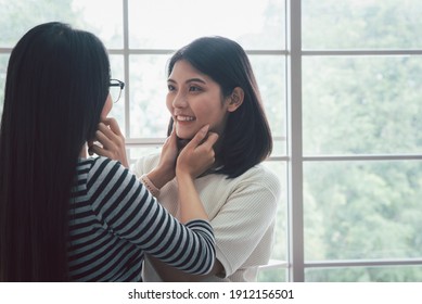 Young asian women lesbian lgbt couple with happy moment. LGBT lesbian couple together indoors concept. - Shutterstock ID 1912156501