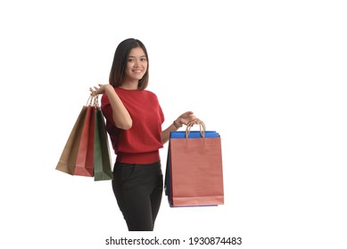 Young Asian Women Is Shopping Happily, On A White Background.