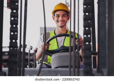 Young Asian Work Man Driving The Truck Over Construction Site. Industrial Factory Worker Operating On Forklift In The Import Export Shipyard. Foreman At Warehouse Logistic In Cargo Freight Ship.