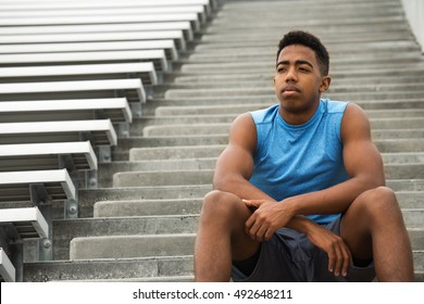 Young athlete thinking about his future.  - Powered by Shutterstock