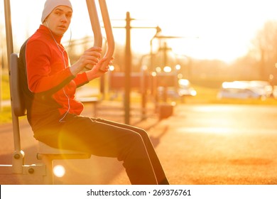 Young Athlete Working-out In An Outdoor Gym