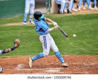 Young athletic boys playing baseball - Powered by Shutterstock