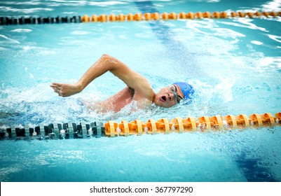 Young Athletic Man With Butterfly Swimming Technique