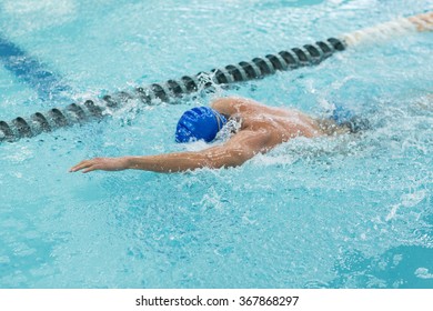 Young Athletic Man With Butterfly Swimming Technique