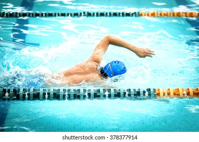 Young Athletic Man With Butterfly Swimming Technique