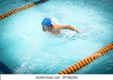 Young Athletic Man With Butterfly Swimming Technique