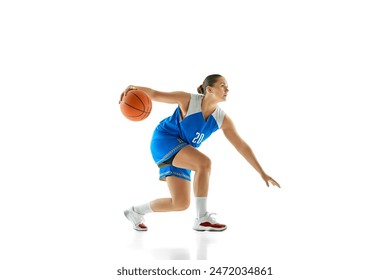 Young athletic woman, basketball player in sportswear preparing to jump to make perfect shot against white studio background. Concept of professional sport, championship, tournament, hobby. - Powered by Shutterstock