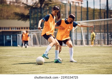 Young athletic women having soccer training at the stadium. - Powered by Shutterstock