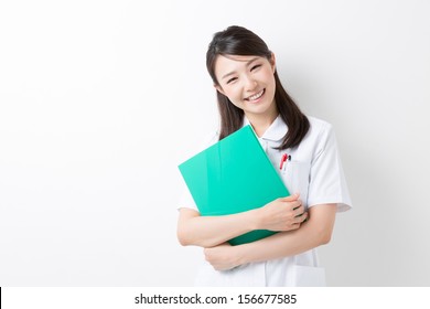 Young Attractive Asian Nurse Of The Smile