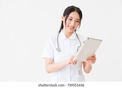 Young Attractive Asian Nurse Of The Smile,tablet PC