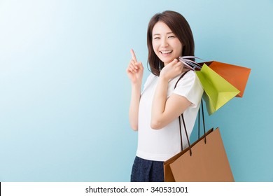 Young Attractive Asian Woman Having Shopping Bags