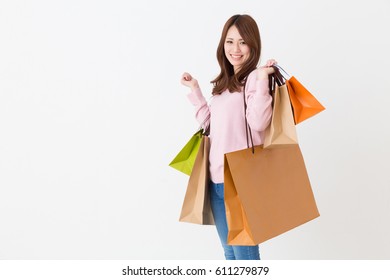 Young Attractive Asian Woman Having Shopping Bags