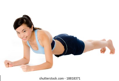 A Young Attractive Asian Woman In Sportswear Doing A Plank Pose