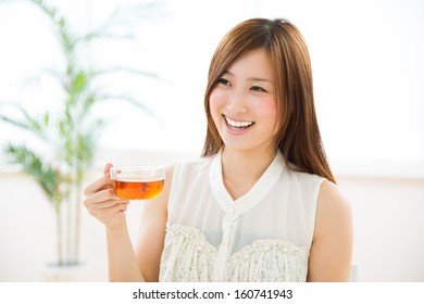 Young Attractive Asian Woman Who Drink Tea