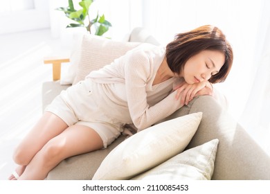 young attractive asian woman who gets tired
