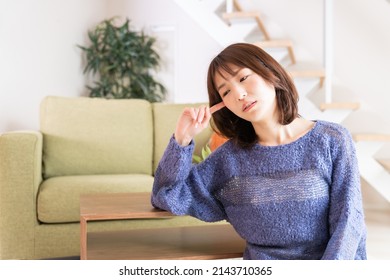 young attractive asian woman who thinks - Shutterstock ID 2143710365