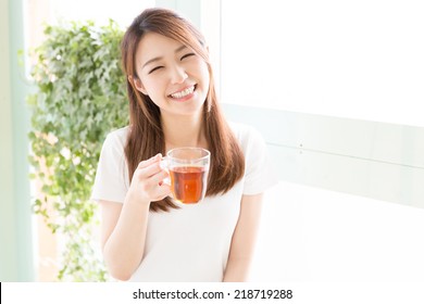 Young Attractive Asian Woman Who Drink Tea