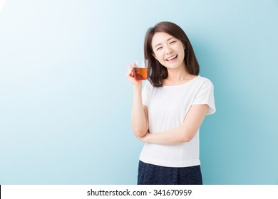 Young Attractive Asian Woman Who Drink Tea