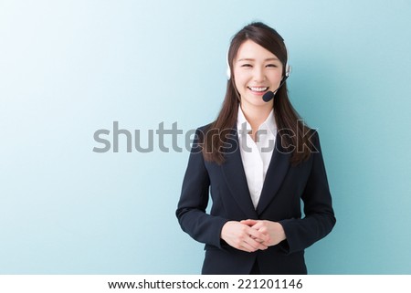 young attractive asian woman who works as an operator