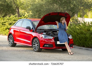 Young Attractive Desperate And Confused Woman Stranded On Roadside With Broken Car Engine Failure Crash Accident Calling On Mobile Phone For Mechanic Assistance In Insurance Company Concept