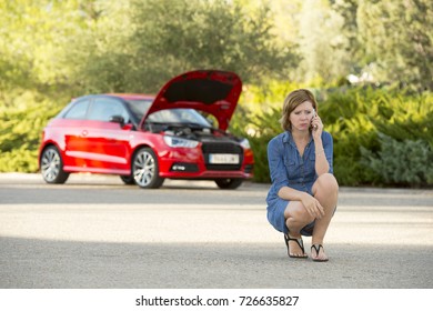 Young Attractive Desperate And Confused Woman Stranded On Roadside With Broken Car Engine Failure Crash Accident Calling On Mobile Phone For Mechanic Assistance In Insurance Company Concept