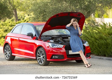 Young Attractive Desperate And Confused Woman Stranded On Roadside With Broken Car Engine Failure Crash Accident Calling On Mobile Phone For Mechanic Assistance In Insurance Company Concept