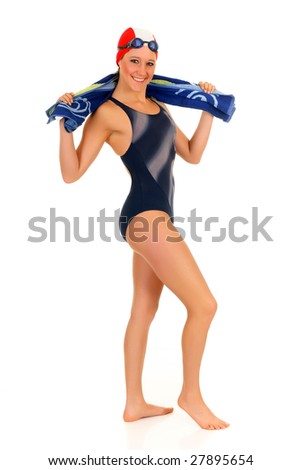 Young attractive female athlete, swimmer with goggles and swimming cap.  Studio shot.