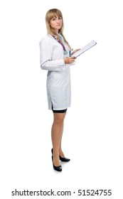 young attractive female doctor is standing with the clipboard and looking in the camera