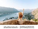 Young attractive female tourist exploring new city at summer. Europe travel. Lifestyle, vacation, tourism, nature, active life.