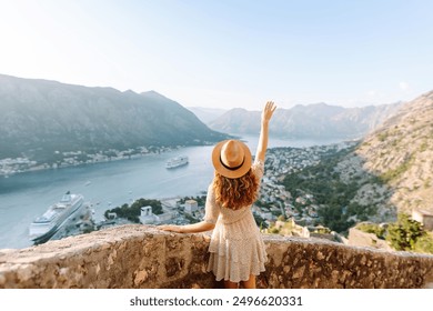 Young attractive female tourist exploring new city at summer. Europe travel. Lifestyle, vacation, tourism, nature, active life.