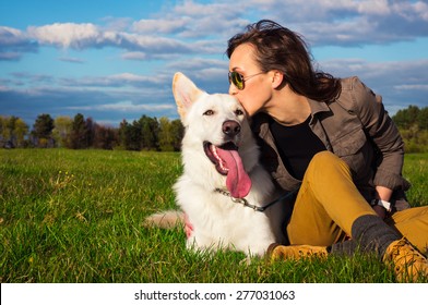 Young Attractive Girl With Her Pet Dog