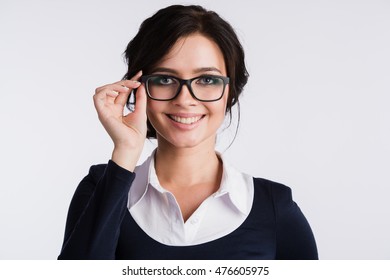 Young Attractive Happy Woman Trying On New Glasses