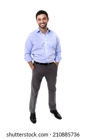 Young Attractive Latin Or Spanish Business Man Standing Full Body Smiling Happy In Corporate Portrait Isolated On White Background Smiling With Hands In Pockets Wearing Shirt And Suit Trousers