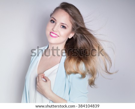 Young attractive laughing blonde happy woman expressive portrait beauty concept