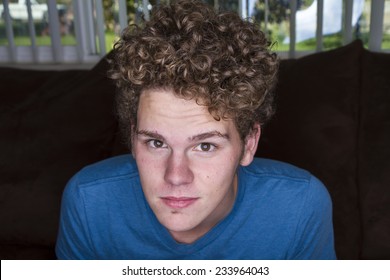 Young attractive male looking at the camera. Image was taken with a ring light - Powered by Shutterstock