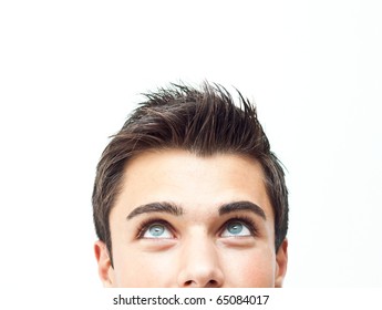 Young attractive man face looking up - Powered by Shutterstock