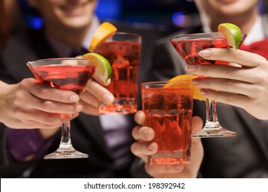 Young Attractive People Of Four Having Cocktail Party